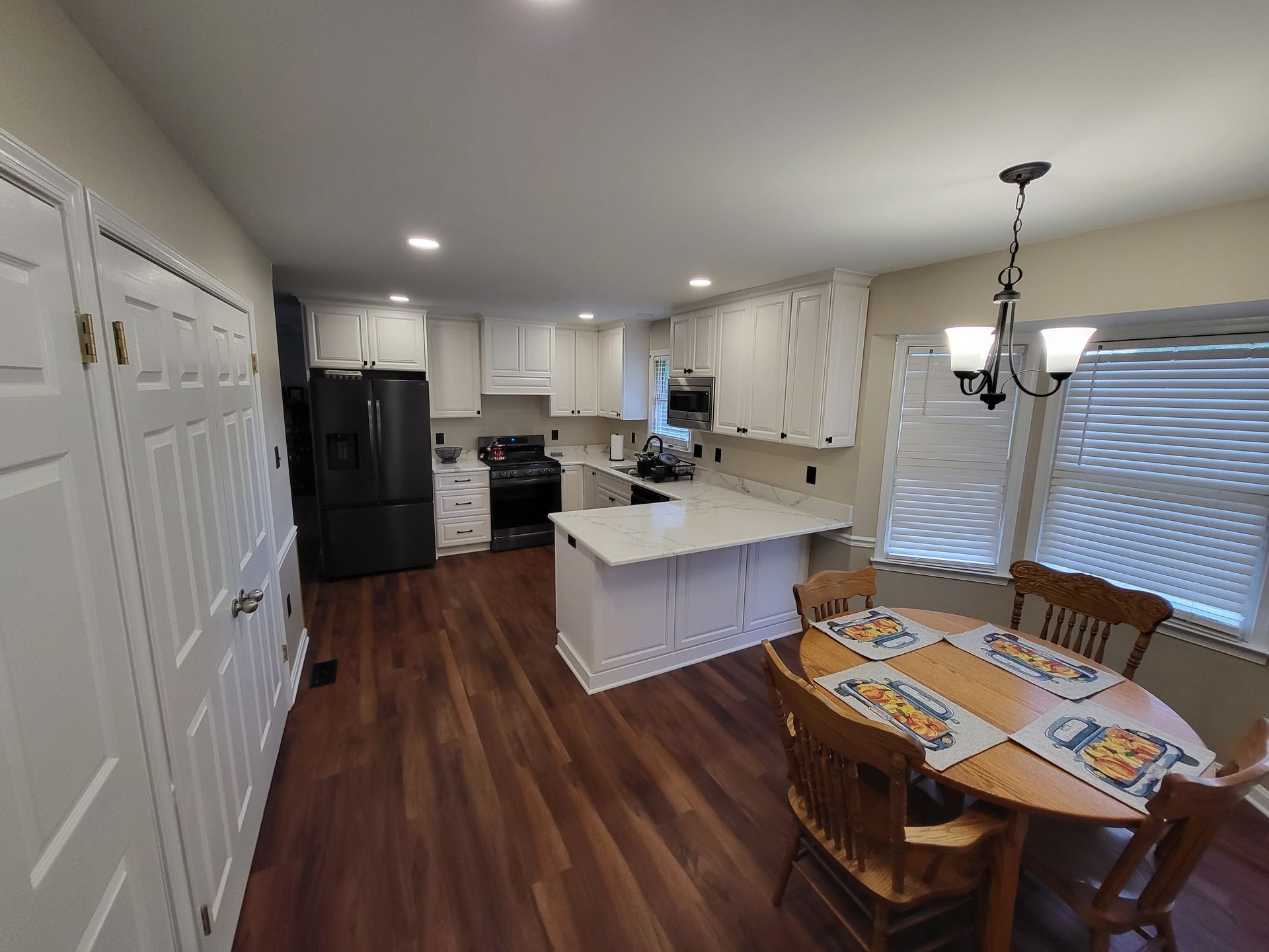 hardwood floors and new cabinets in kitchen remodeling