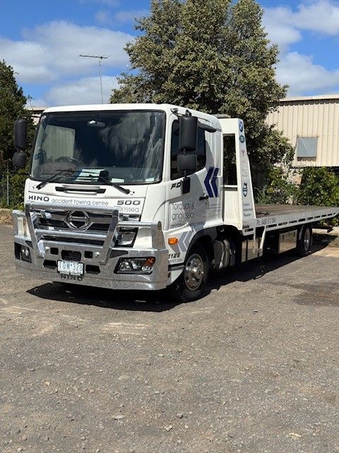 A white tow truck is parked in a parking lot — Torquay & Anglesea Accident Towing Centre In Torquay, VIC
