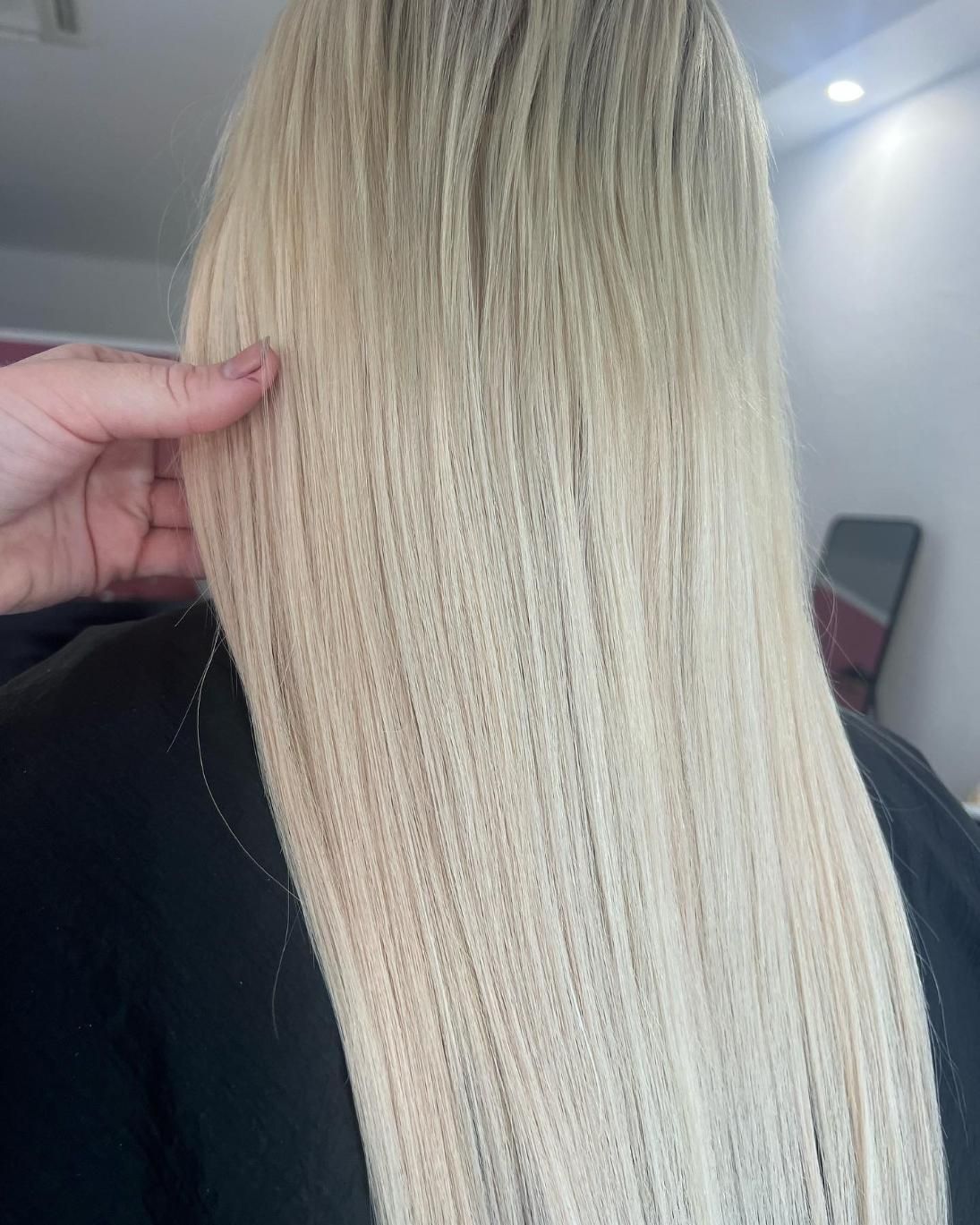 A Woman Is Getting Her Hair Braided in A Salon — Losh Hair Lounge In Toowoomba City, QLD