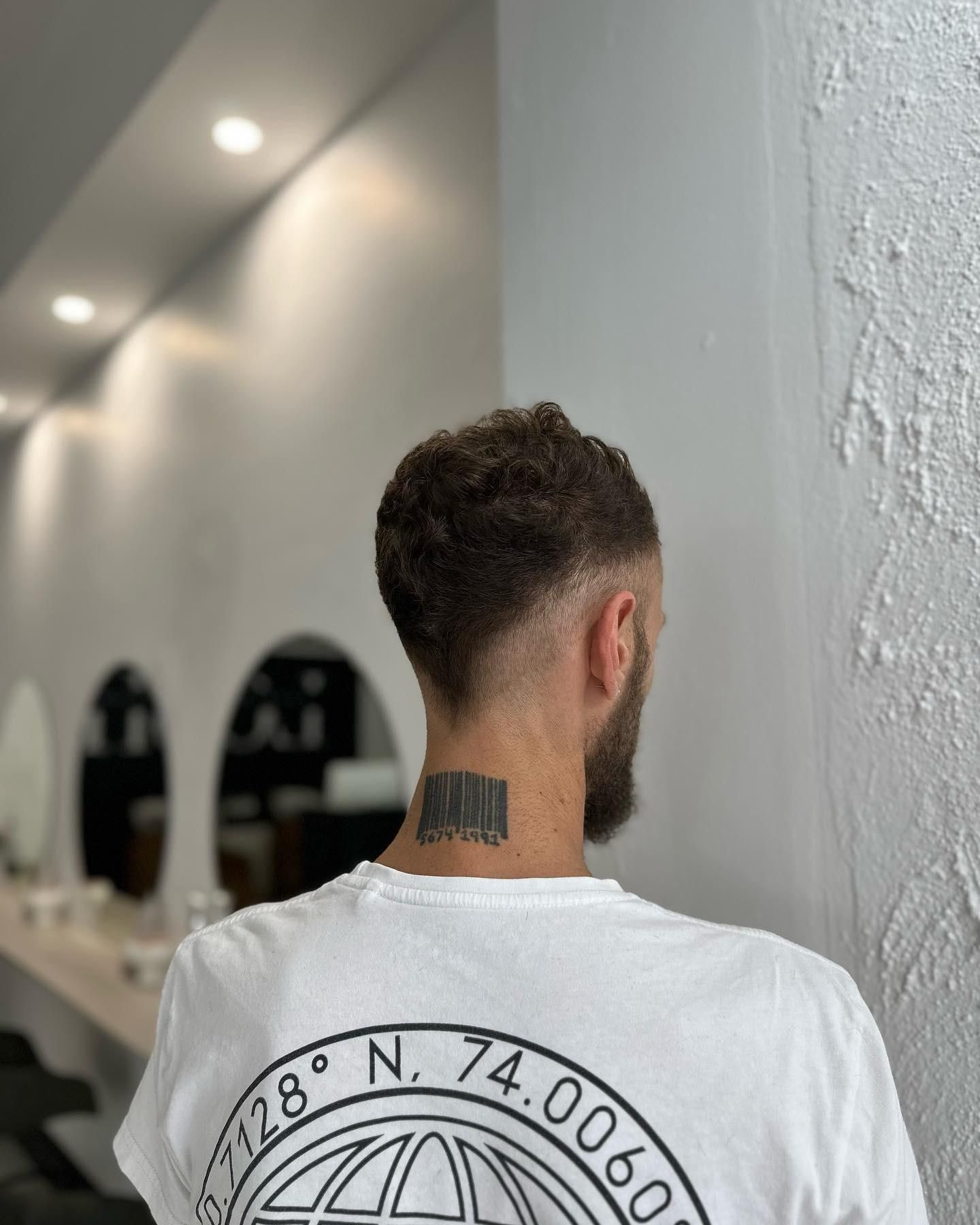 A Man with A Tattoo on His Neck Is Wearing a White T-Shirt — Losh Hair Lounge In Toowoomba City, QLD