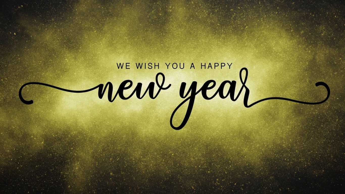 A person is praying with their hands up in front of a cross.