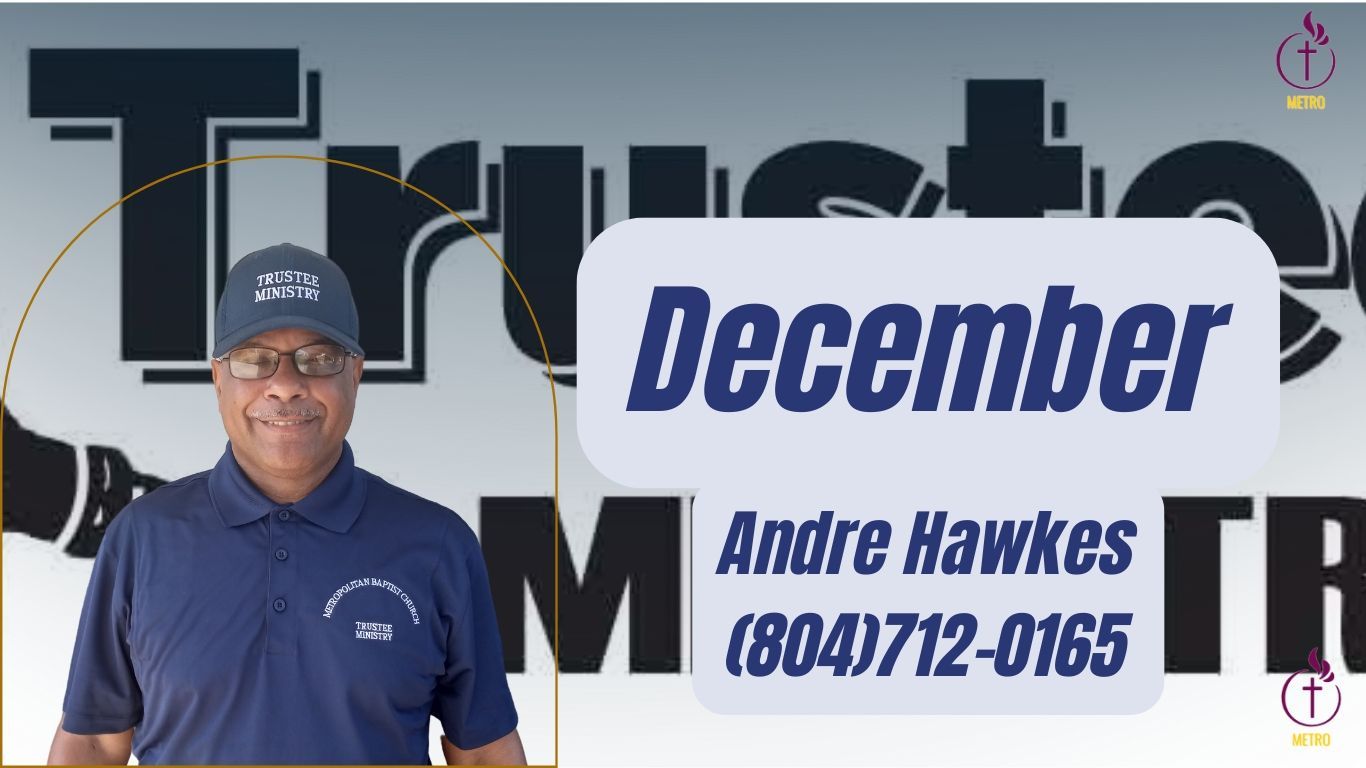 A man standing in front of a sign that says april