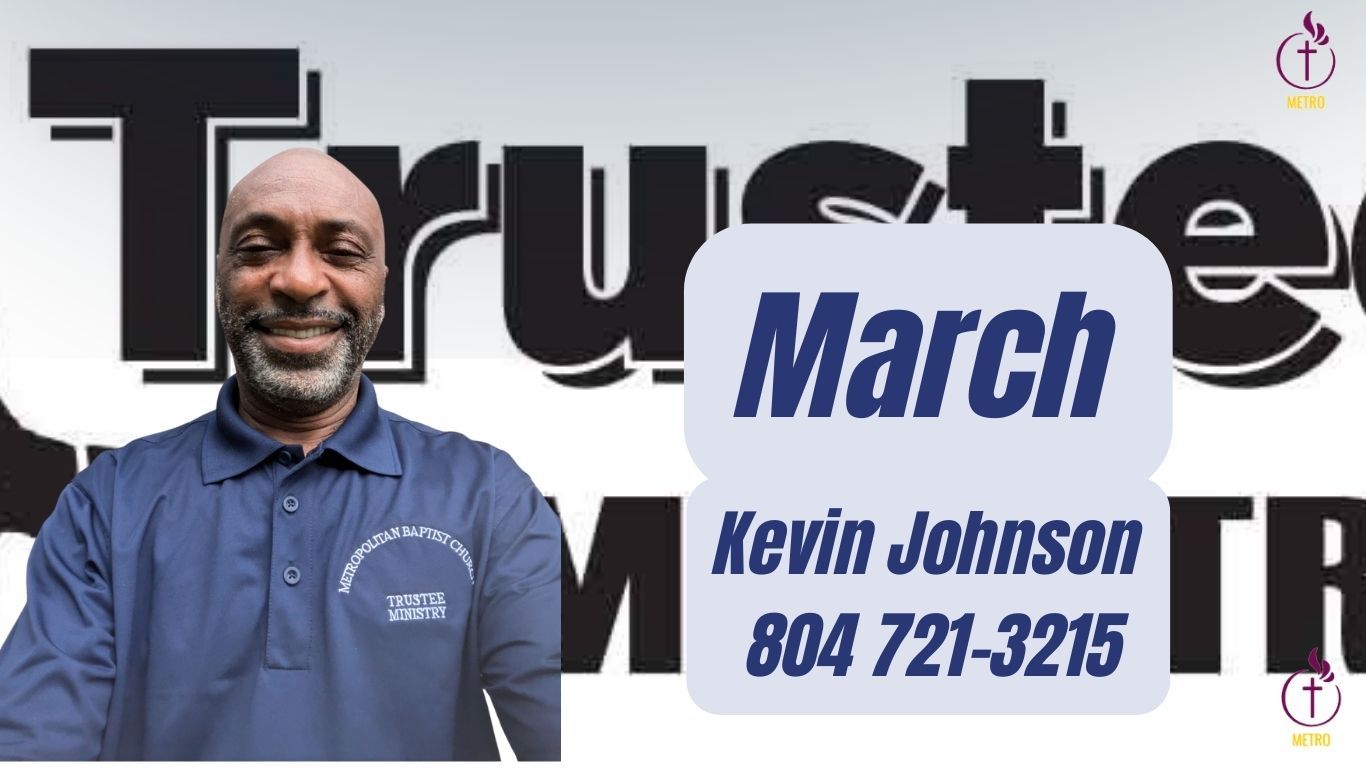 A man standing in front of a sign that says april