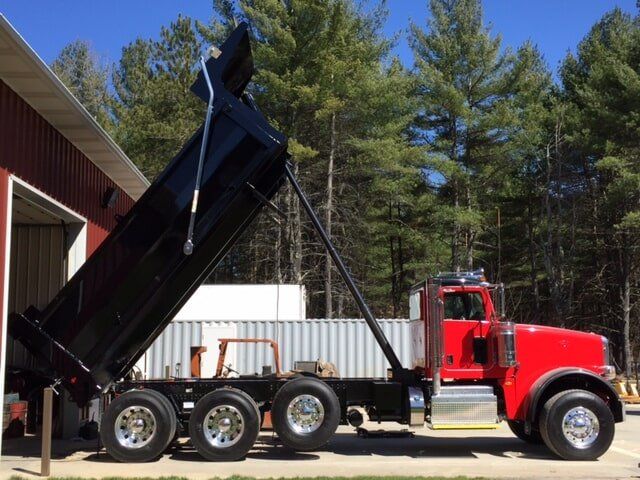 Dumpster — Truck with Red Paint in Wilton, NH
