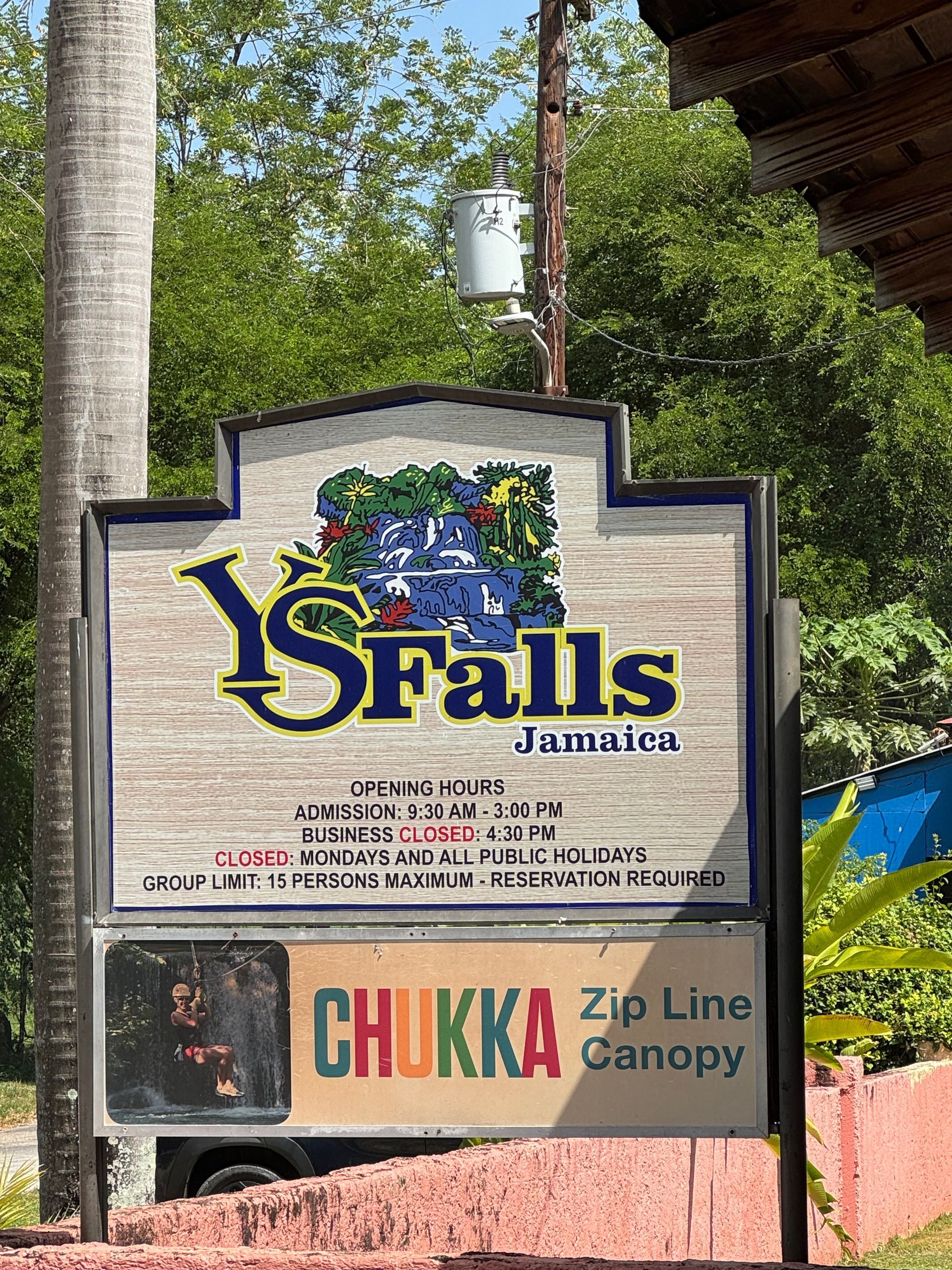 Sign for YS Falls and Chukka Zip Line Canopy in Jamaica.