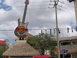 A statue of a guitar with the word hard rock on it