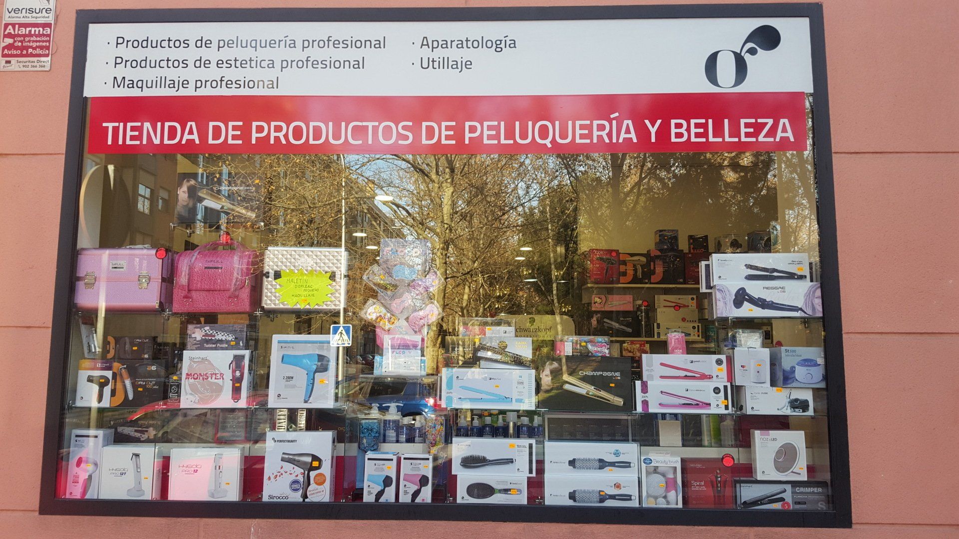 A store front with a sign that says tienda de productos de peluqueria y belleza