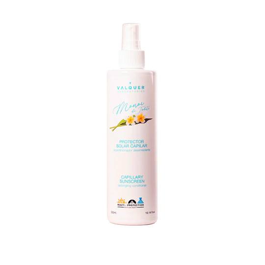 Una botella de spray blanca con una flor amarilla encima.