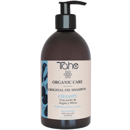 Una botella de champú de aceite original Tohe Organic Care