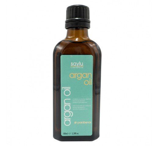Una botella de aceite de argán con etiqueta verde.