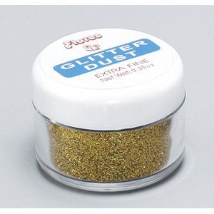 Un frasco de polvo de purpurina dorada extrafino