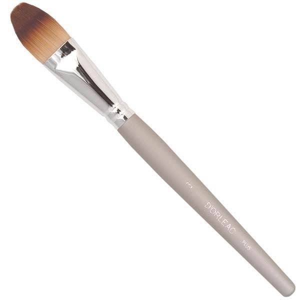 Un pincel de maquillaje con la palabra perla.