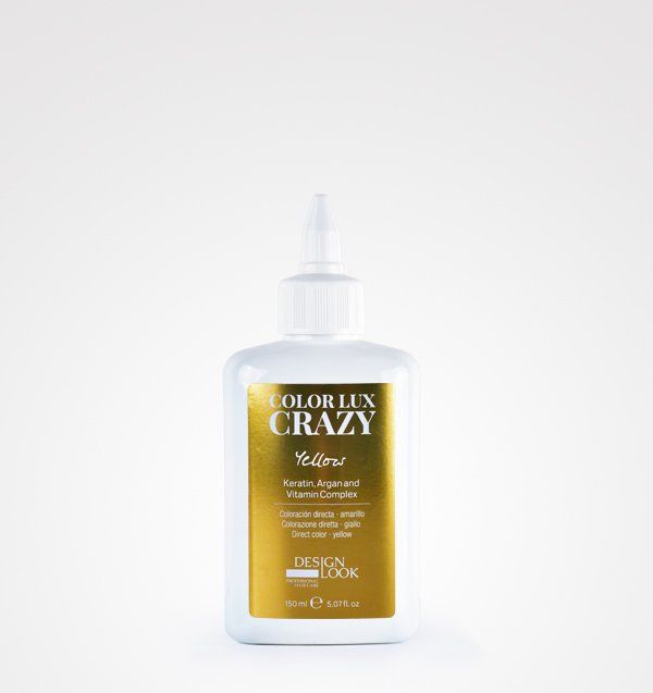 Una botella de tinte para el cabello color lux color amarillo loco sobre un fondo blanco.