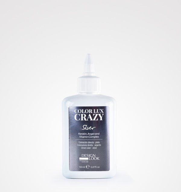 Una botella de tinte para el cabello color lux crazy silver sobre un fondo blanco.
