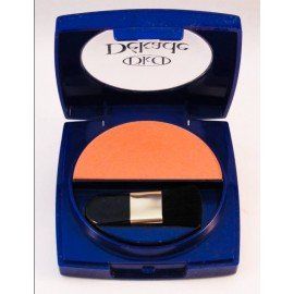 Un recipiente de maquillaje azul con un pincel dentro.