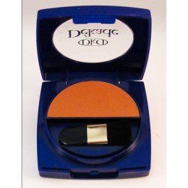 Un recipiente azul con un pincel dentro que dice dkcd