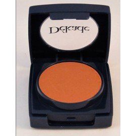 Un recipiente de maquillaje con la palabra dekyge.