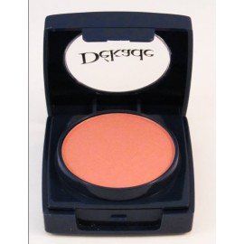 Un rubor en un recipiente negro con la palabra dek escrita en él.