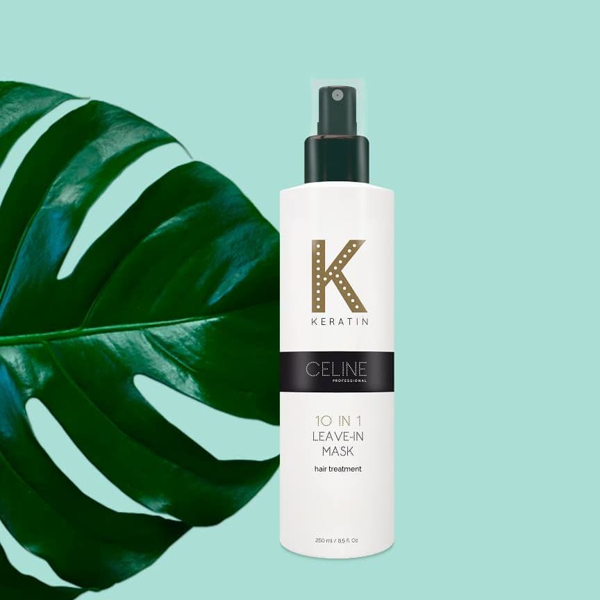 Una botella de mascarilla sin enjuague 10 en 1 de Celine está junto a una hoja.