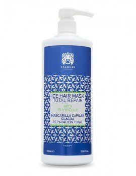 Una botella de mascarilla capilar de hielo reparación total con aceite de argán.
