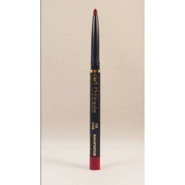 Un lápiz labial rojo está sobre una superficie blanca.