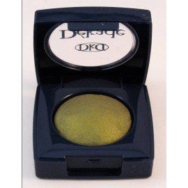 Una sombra de ojos amarilla en un estuche negro con la palabra dkd.