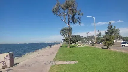 HWH San Diego Hard Money Lender - Real Estate highlights the scenic lifestyle of San Diego with destinations like Chula Vista Bayfront Park. The image captures open green spaces, waterfront views, and relaxing coastal scenery that reflect the city’s vibrant community.