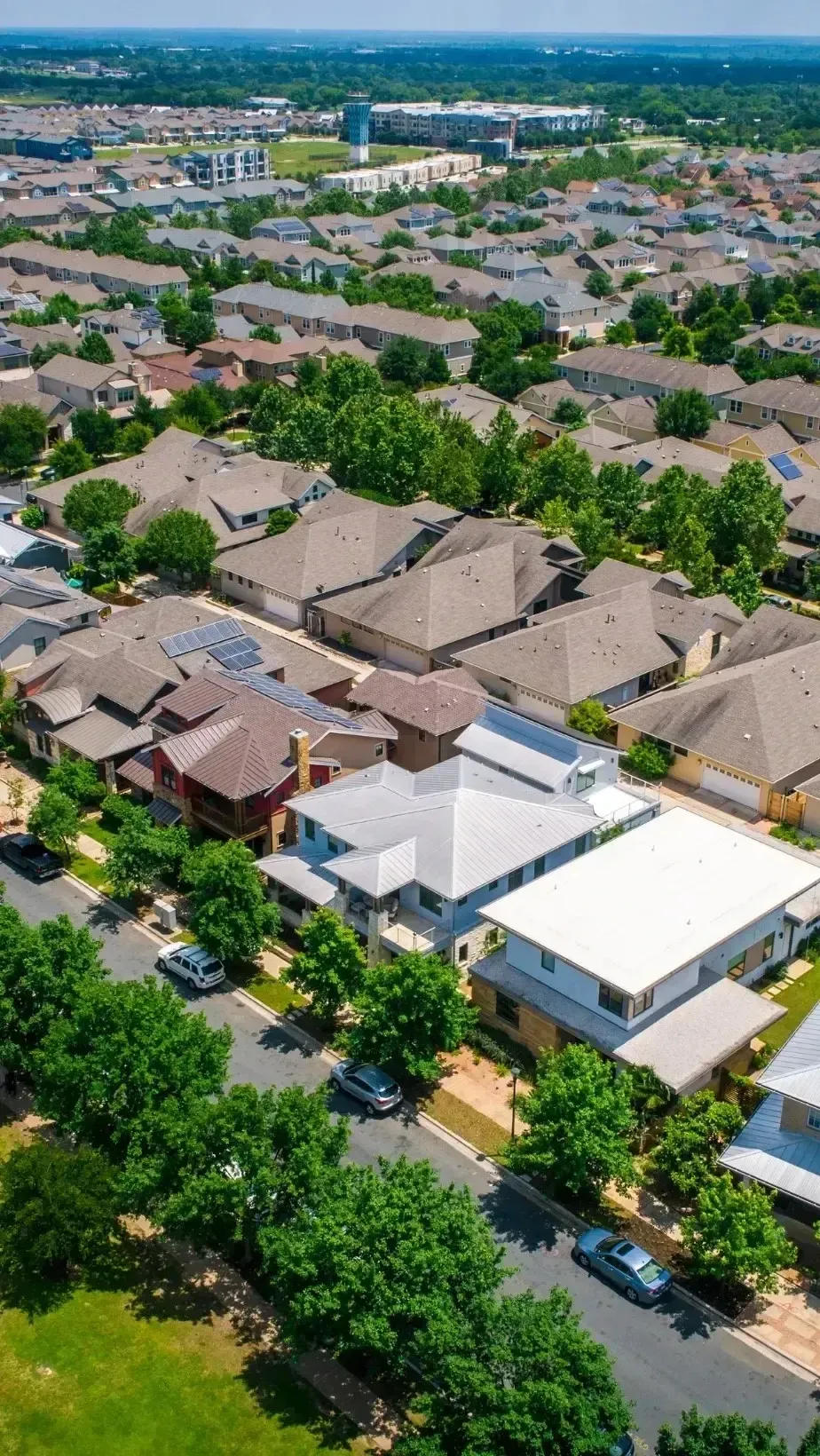 HWH San Diego Hard Money Lender - Real Estate shows a clear aerial view of houses on a sunny day, highlighting the beauty and structure of a thriving neighborhood.