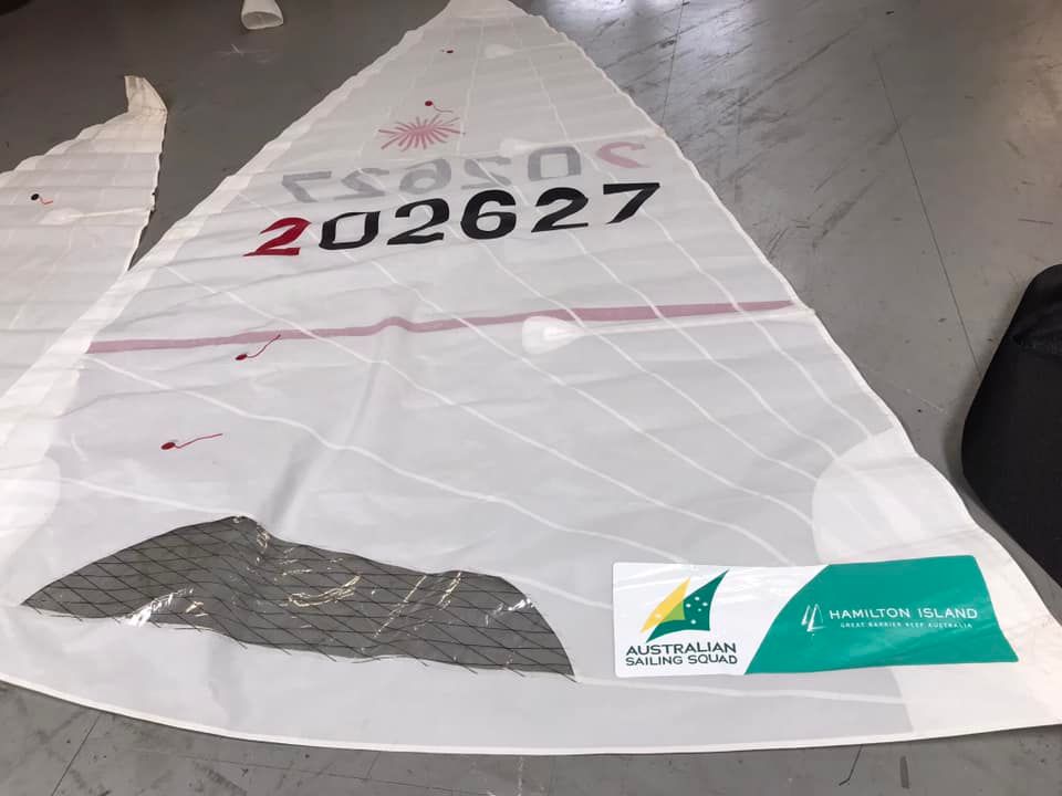 A Large Piece of White Fabric is Laying on the Floor in a Room — Off Shore Sails & Rigging In North Boambee Valley, NSW