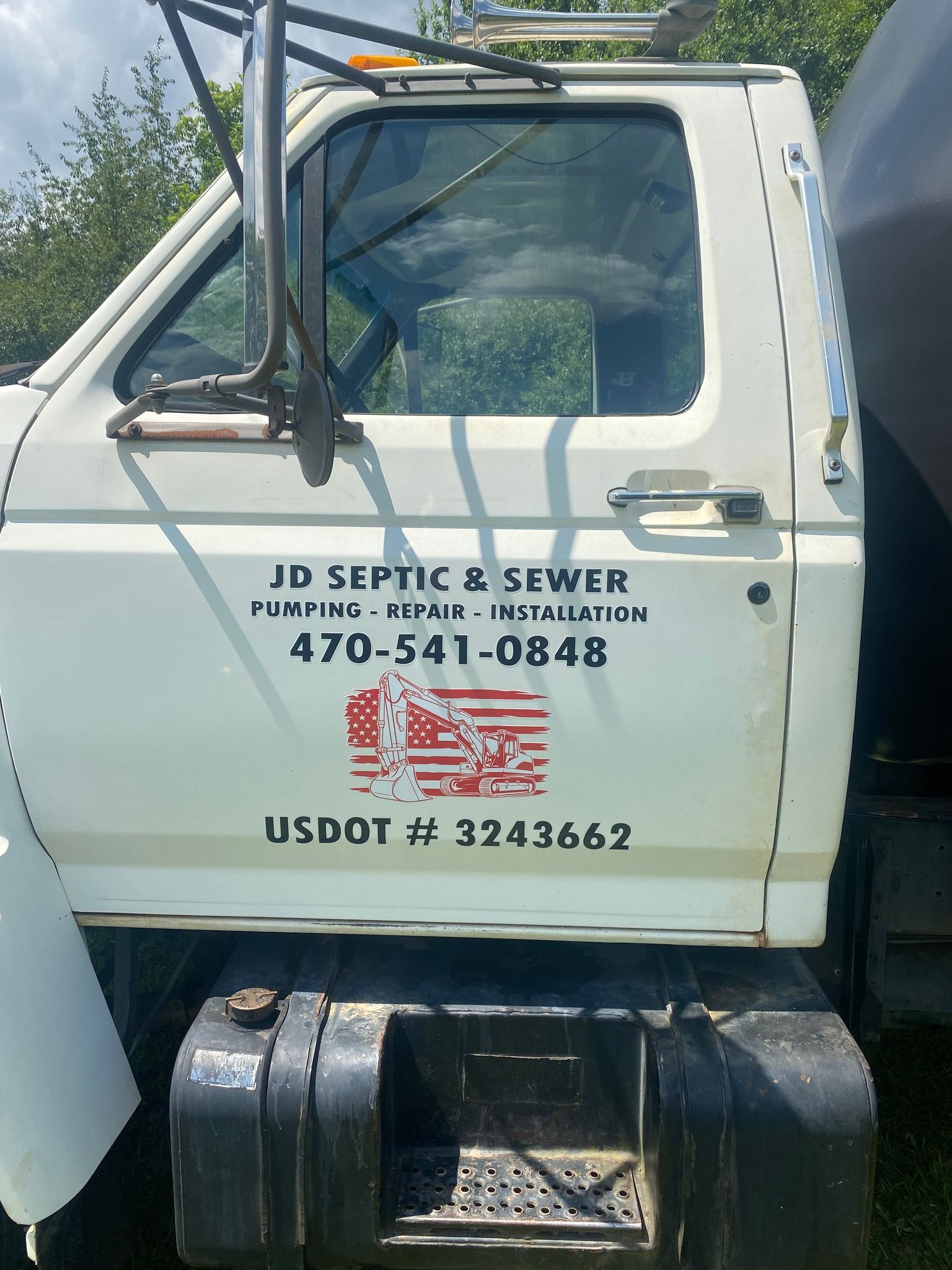 White septic truck with 