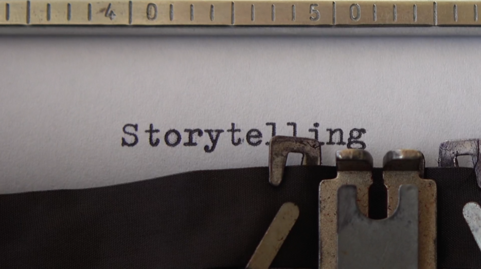 The word storytelling is typed on a typewriter