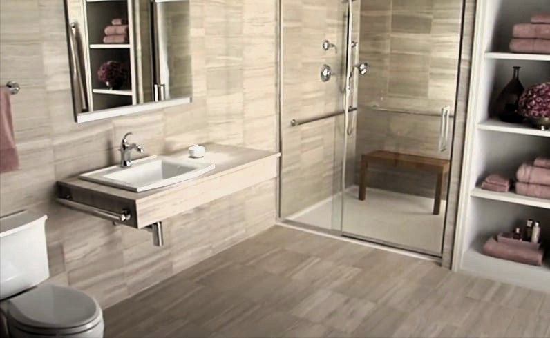 Accessible bathroom remodel with modern fixtures in neutral tones