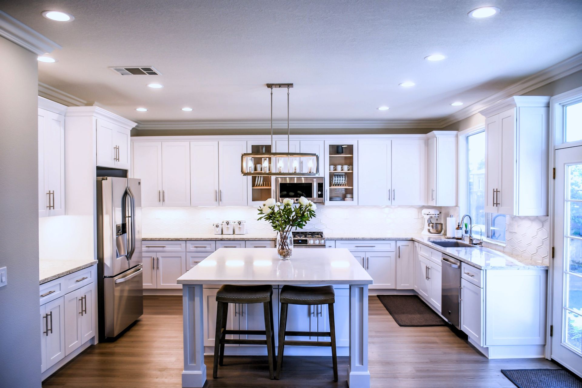 Winter-ready kitchen with white wooden cupboards.