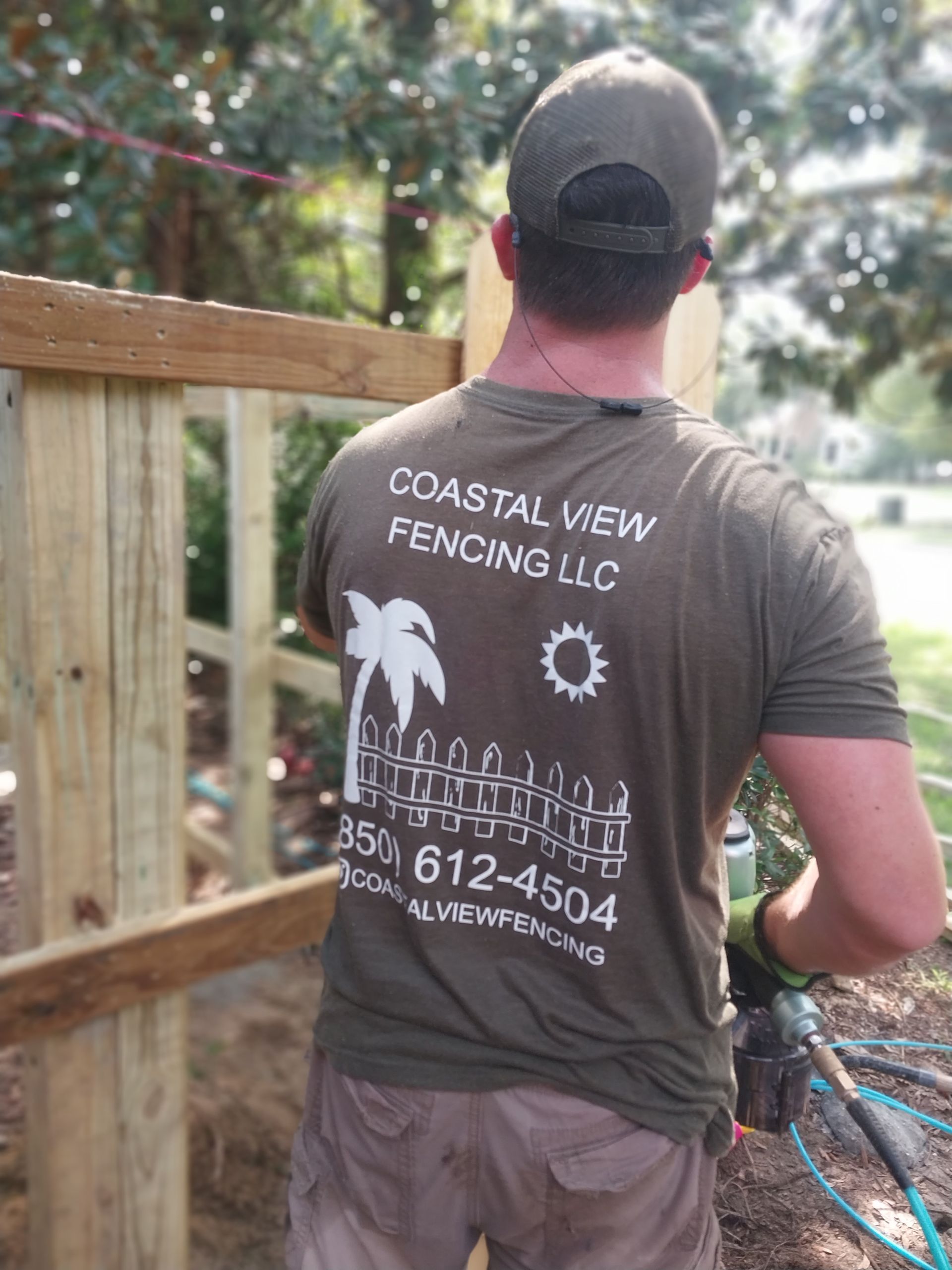 A Man Wearing a Coastal View Fencing T-Shirt — Crestview, FL — Coastal View Fencing LLC