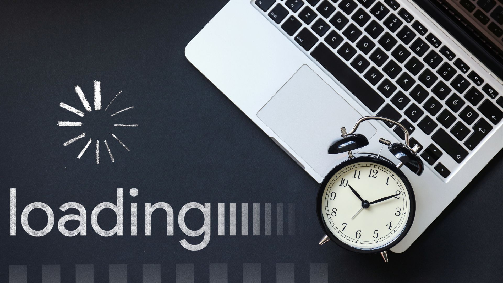 laptop loading with alarm clock