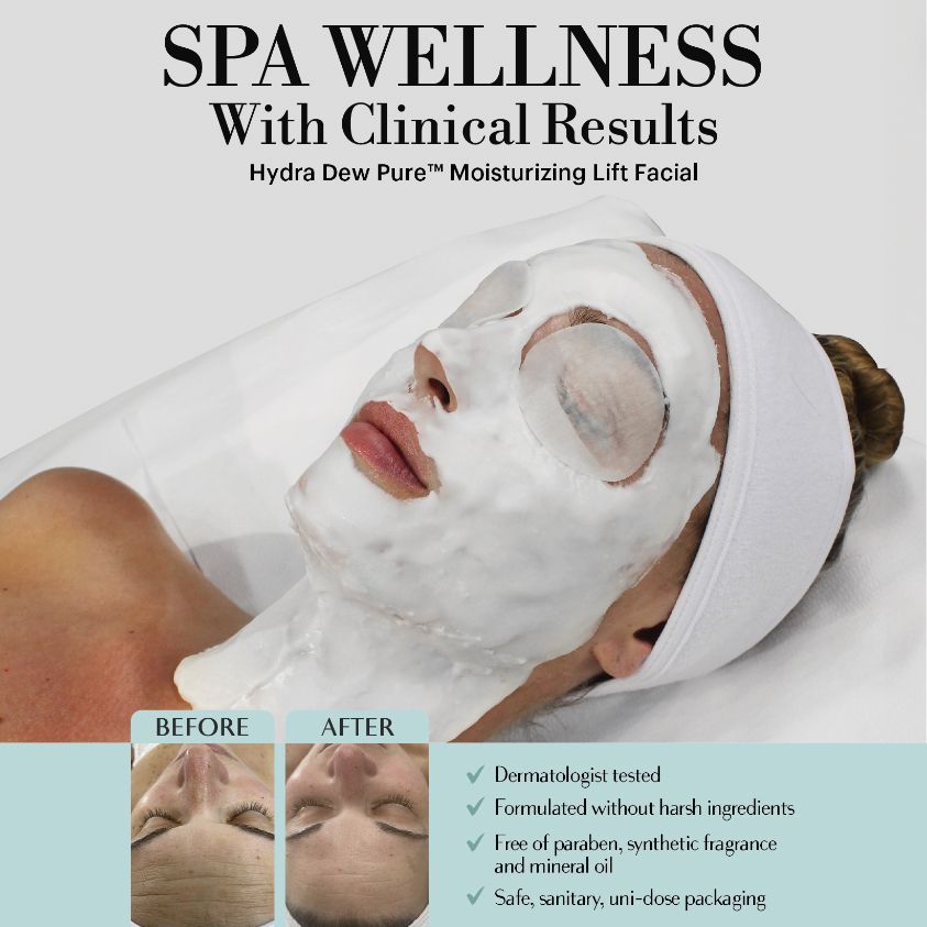 Woman with closed eyes, green facial mask, being treated with brush at a spa.