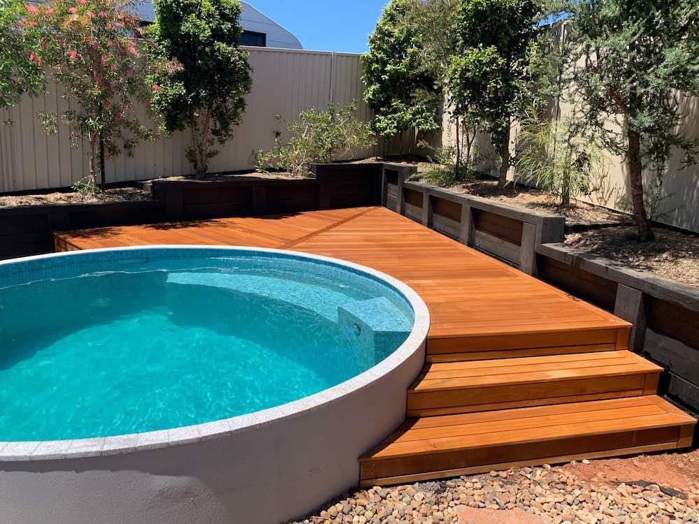Round Pool With Wood Panel - Builders in Northern Rivers, NSW