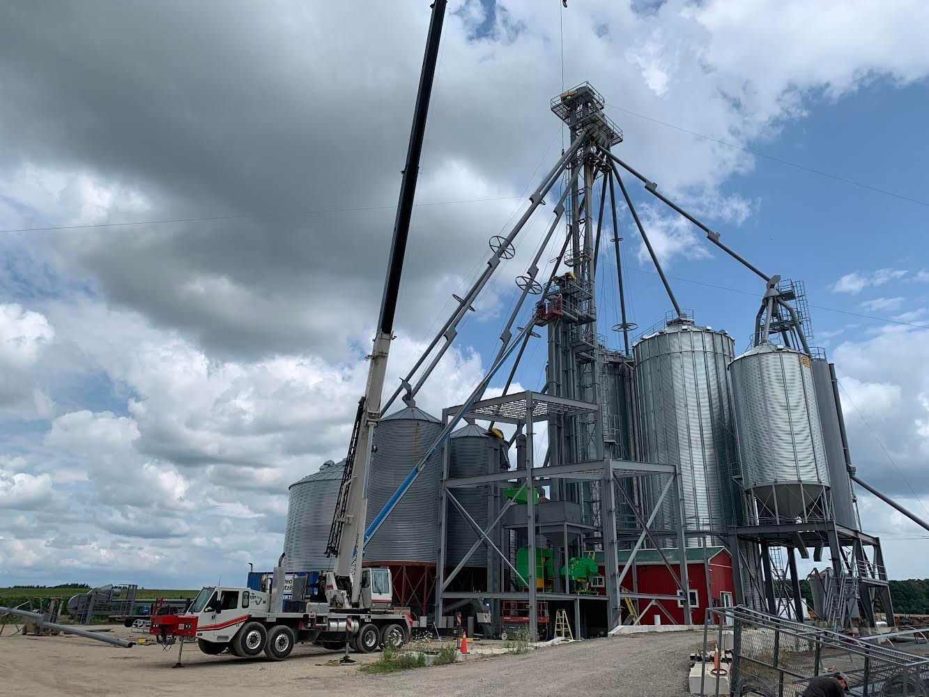 A crane is being used to lift a large structure.