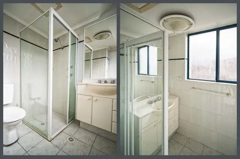 Two-part bathroom: glass shower, vanity, toilet, and window; white walls and tile; neutral colors.