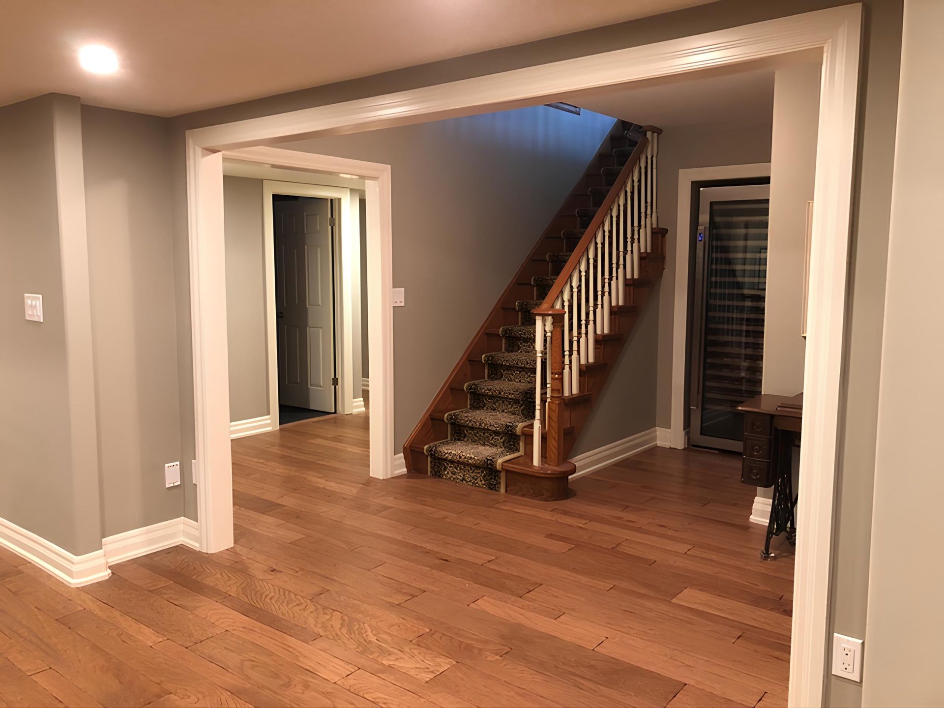 There is a staircase in the middle of the room.