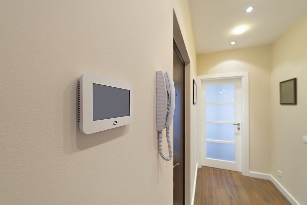 Hallway With an Intercom System on a Beige Wall — Flexicoms Communications in Tully, QLD