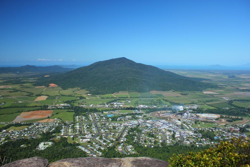 View from A Mountain Overlooking a Town and Green Fields — Flexicoms Communications in Tully, QLD 