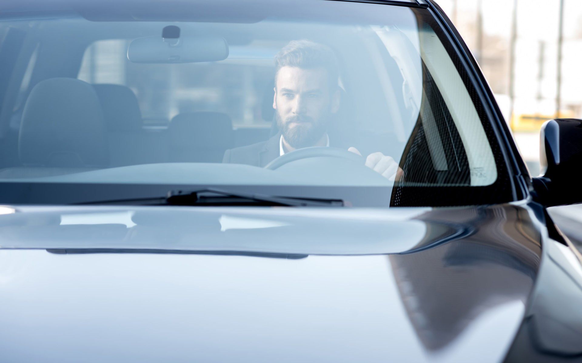 Auto Glass — Man Driving his Car in Lombard, IL