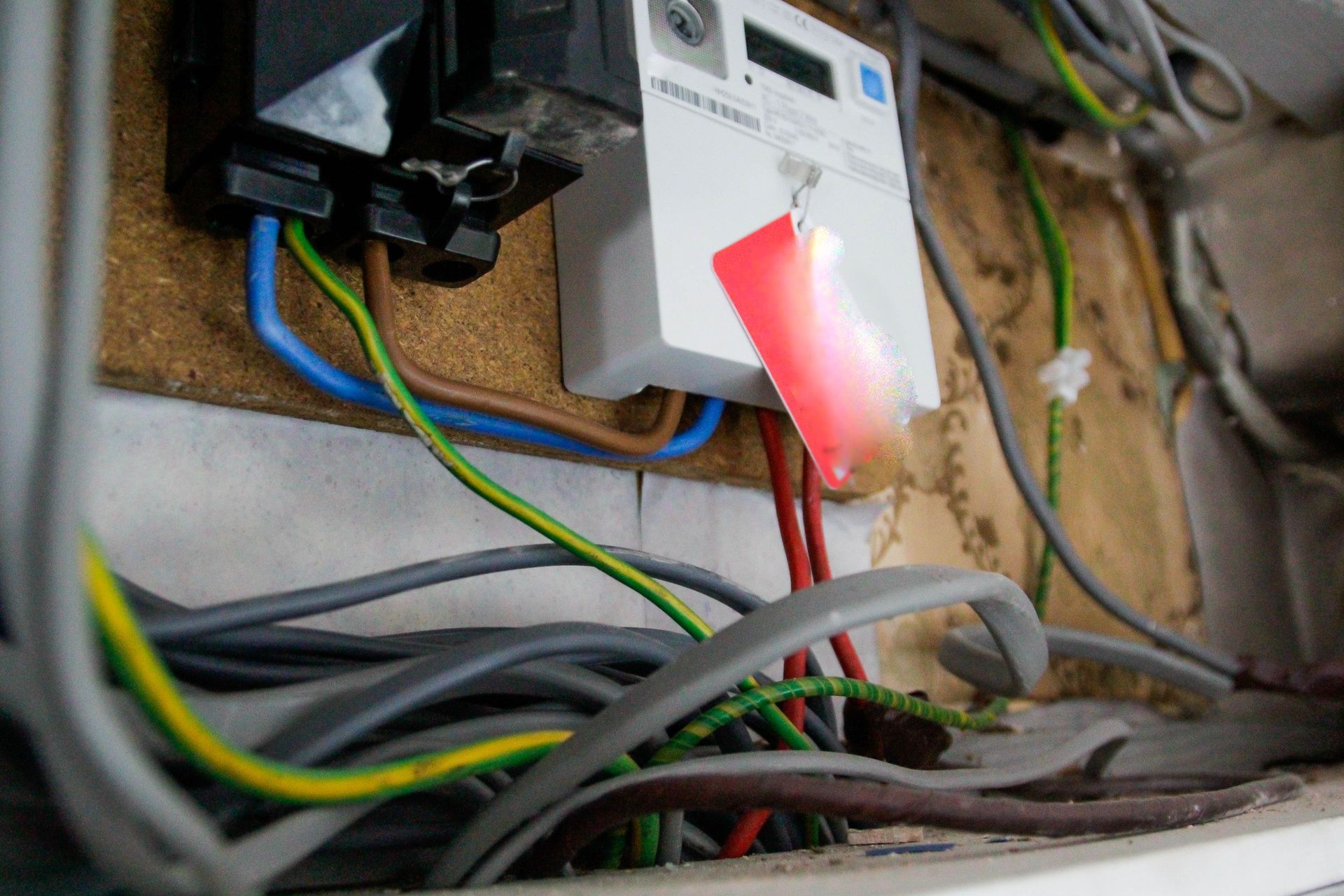 A bunch of wires are connected to an electrical box