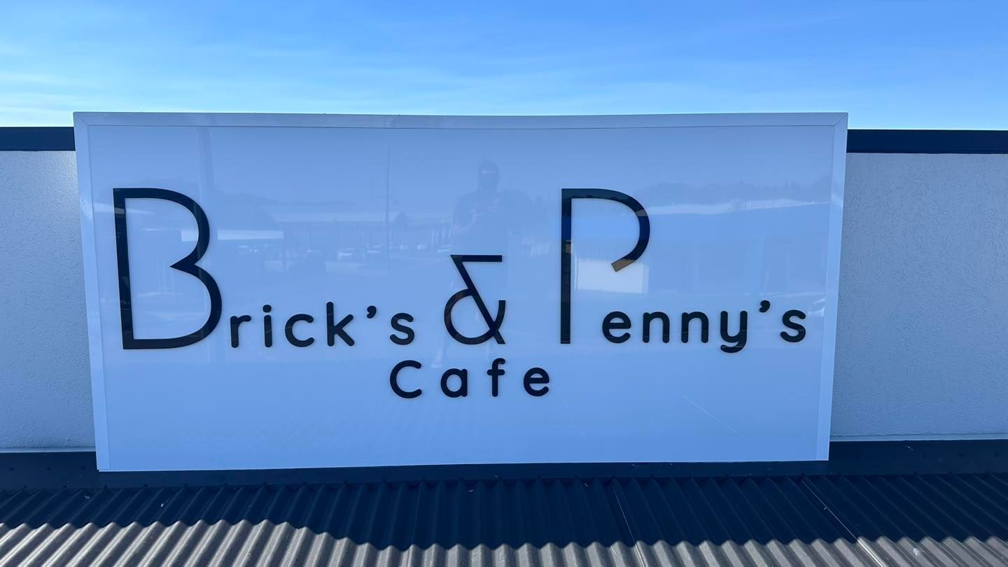 A White Sign for Brick 's & Penny 's Cafe  — Global Signage In Ingham, QLD