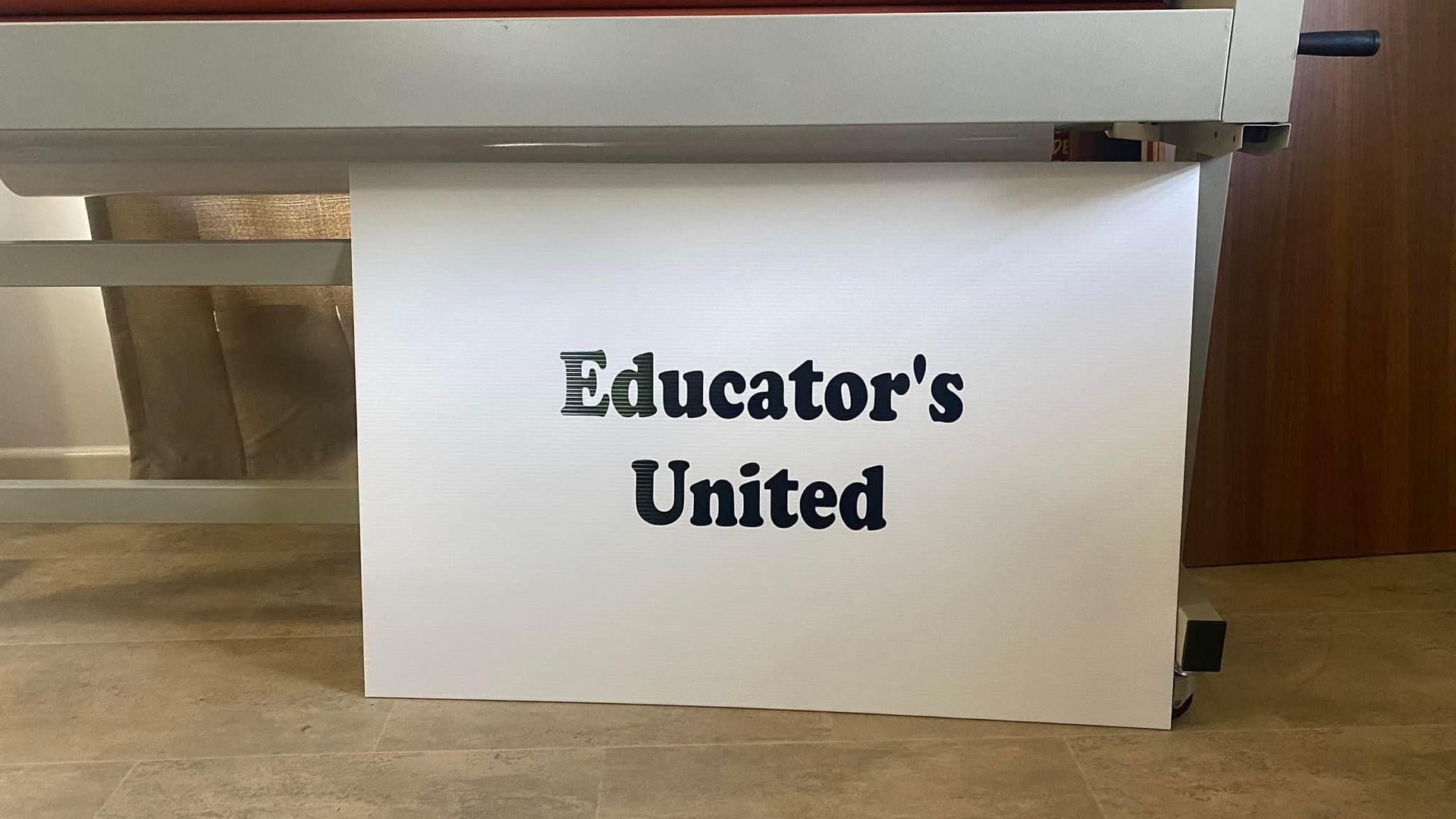 A Sign That Says ' Educator 's United ' on It — Global Signage In Ingham, QLD