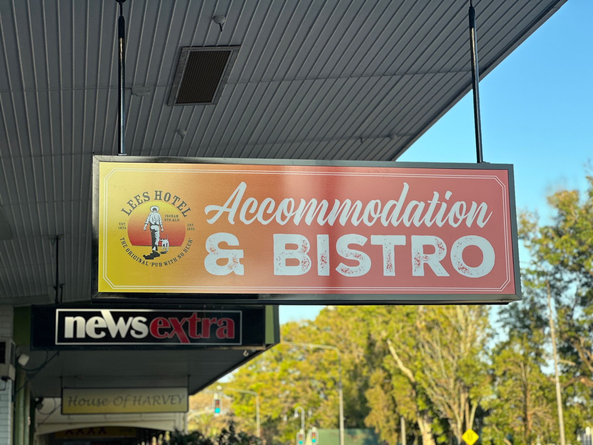 A sign for accommodation and bistro hangs from the ceiling — Global Signage In Ingham, QLD