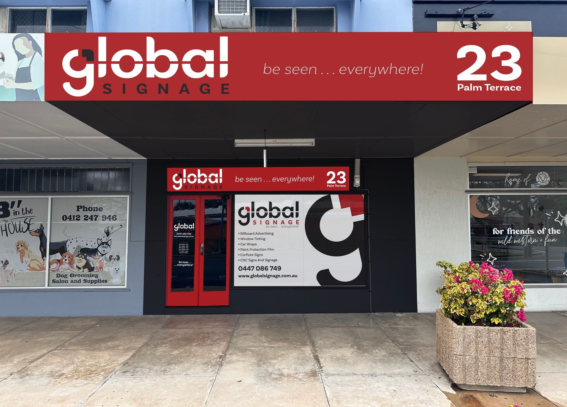 A building with a sign that says global signage on it — Global Signage In Ingham, QLD