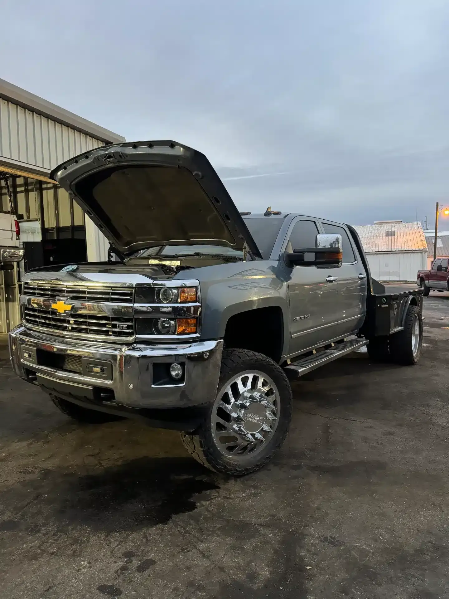Gray Truck with Hood Up showing Engine | DMR Diesel Repair, Inc
