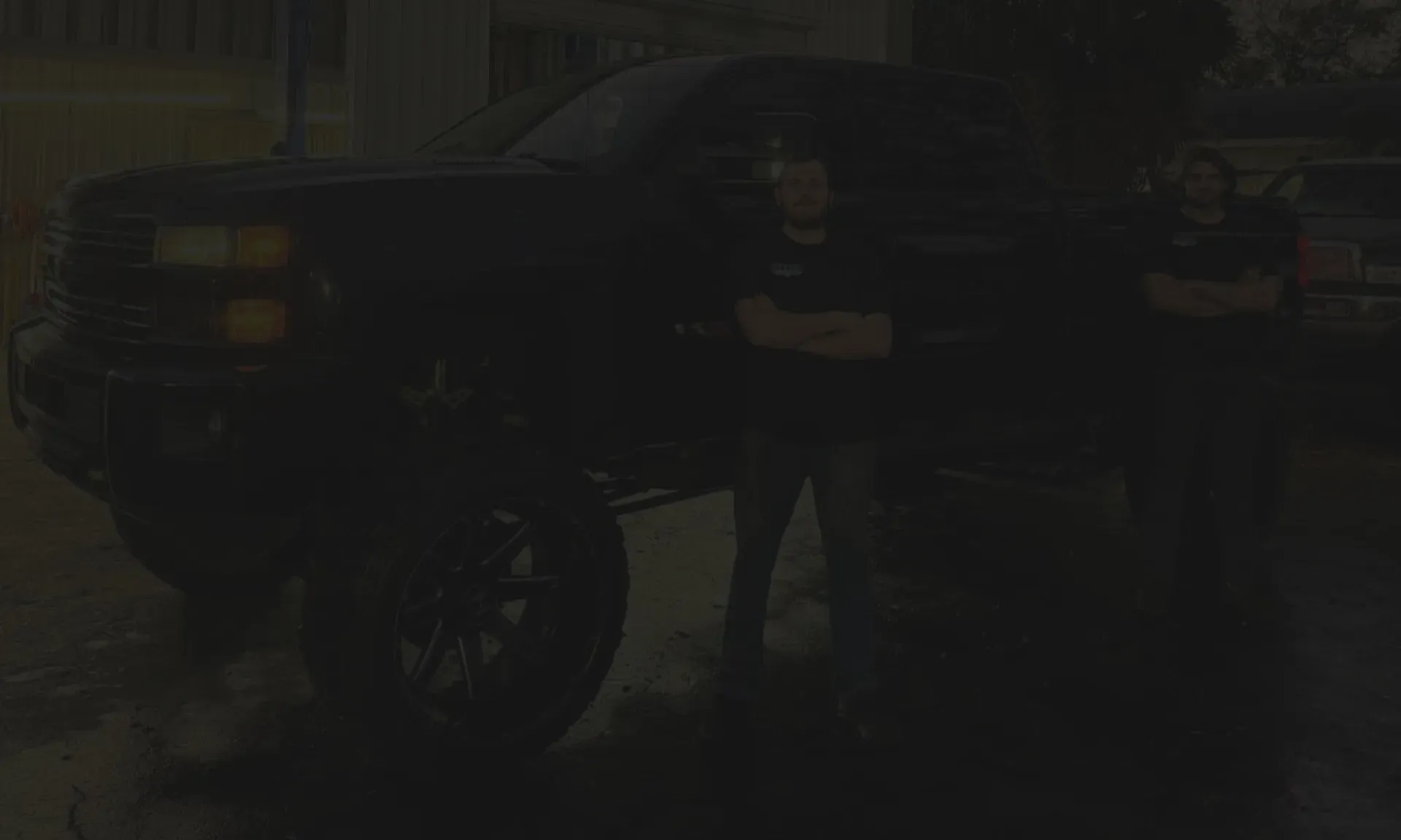 Two staff members in front of Truck | DMR Diesel Repair, Inc